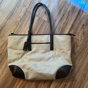 Tumi purse. A few minor stains but overall in good condition.